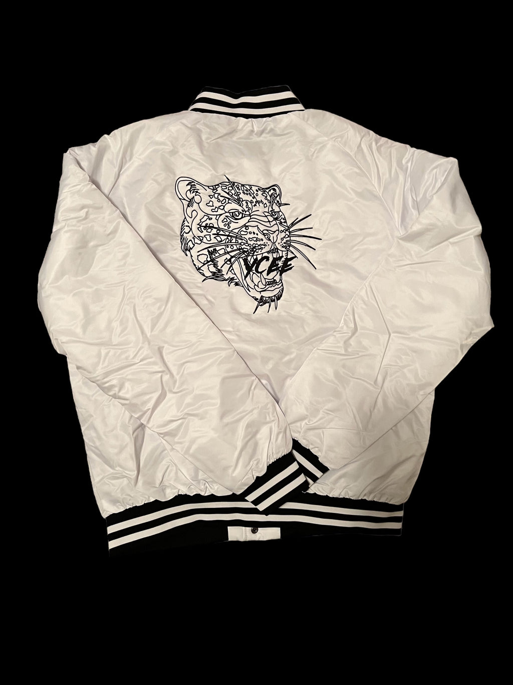 White jacket with black Jaguar design and text on a black background