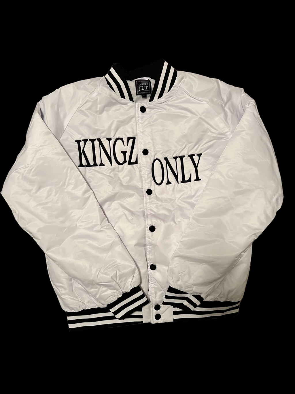 White jacket with 'KINGZ ONLY' text on a black background